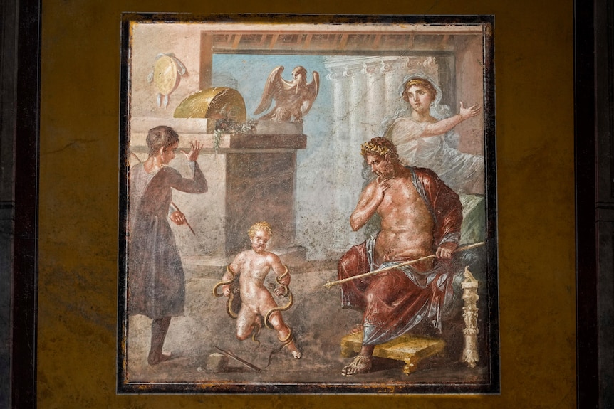 A roman mural showing a young hercules fighting a snake as other people watch on. 