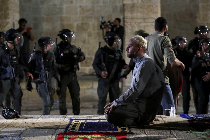 Man prays at Al-Aqsa