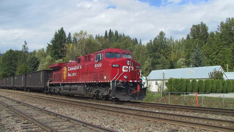 A Canadian Pacific freight train travels through Revelstoke, British Columbia.