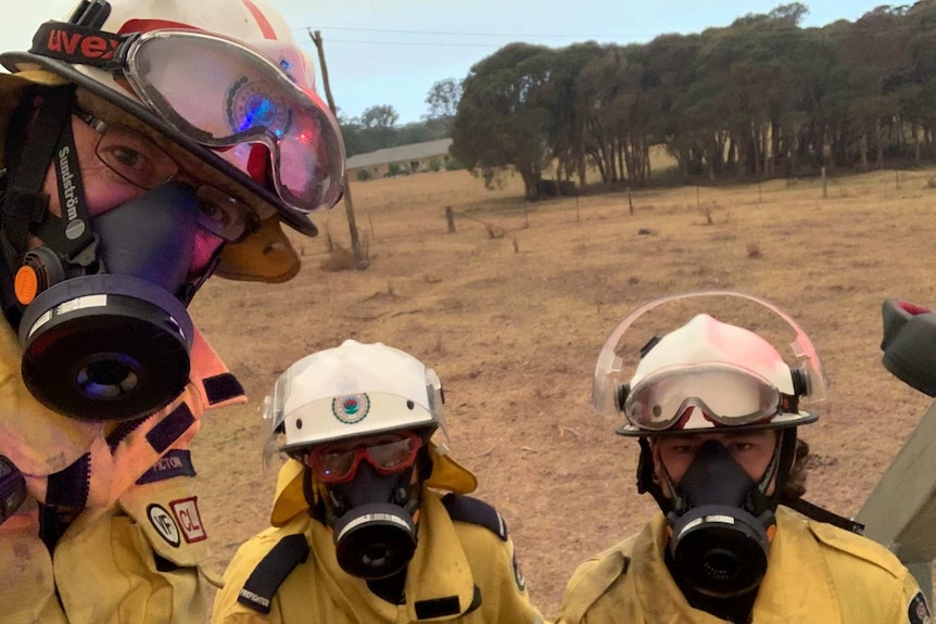 RFS member Mark Davis wear a gifted mask with his colleagues in the field.