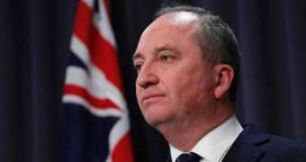 Headshot of Barnaby Joyce looking to facing left, with a neutral expression