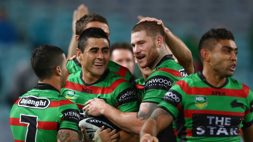 South Sydney players celebrate the try by Bryson Goodwin against North Queensland.