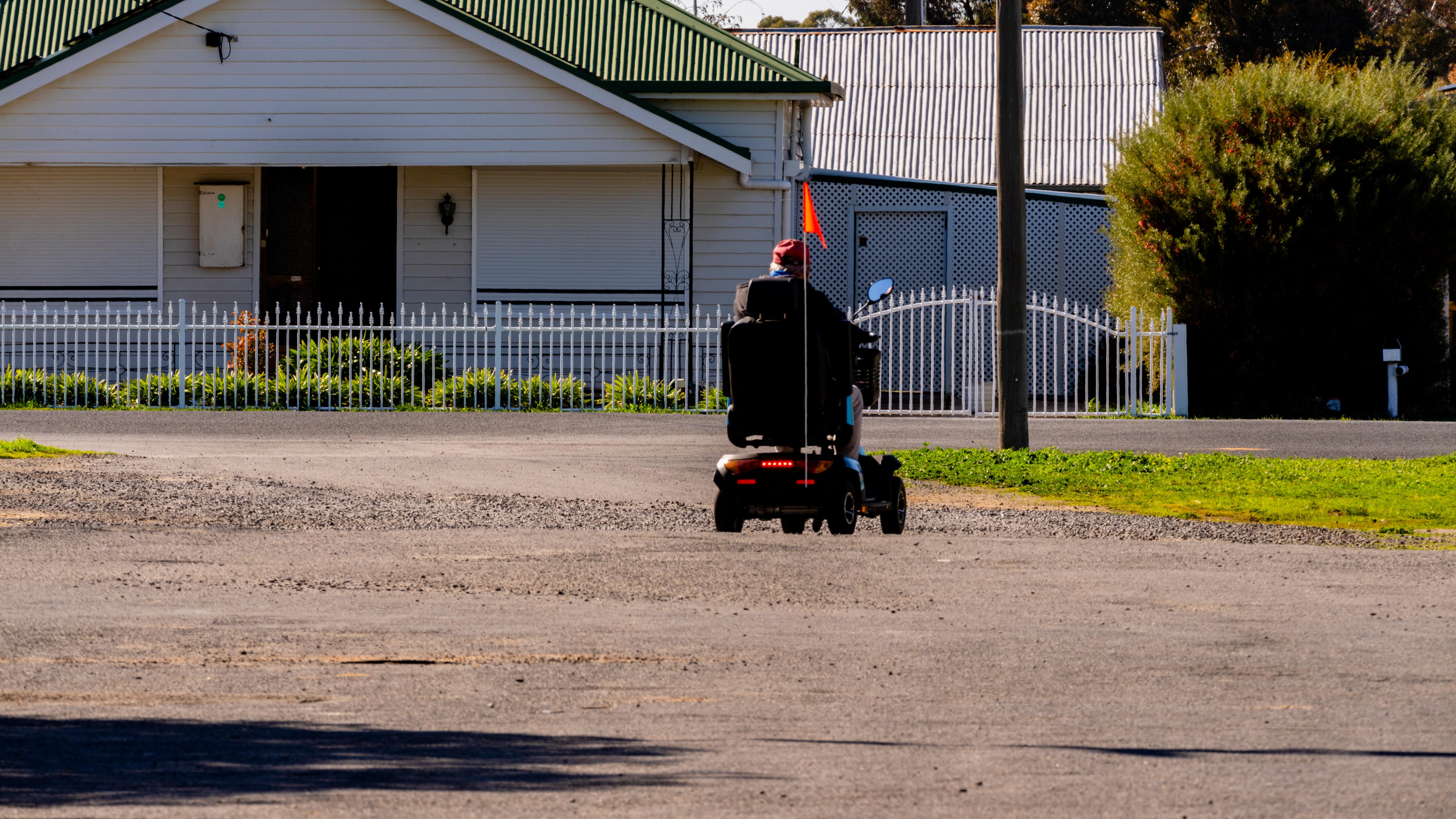 A man using a motorised scooter