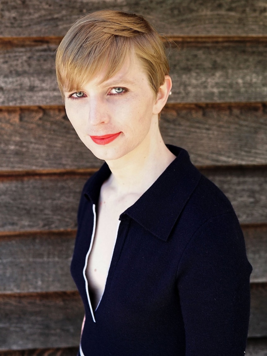 Chelsea Manning looks at the camera.