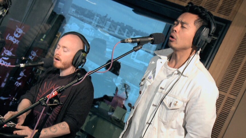 A photo of The Temper Trap doing a live performance of 'Don't Fight It' in the triple j studios