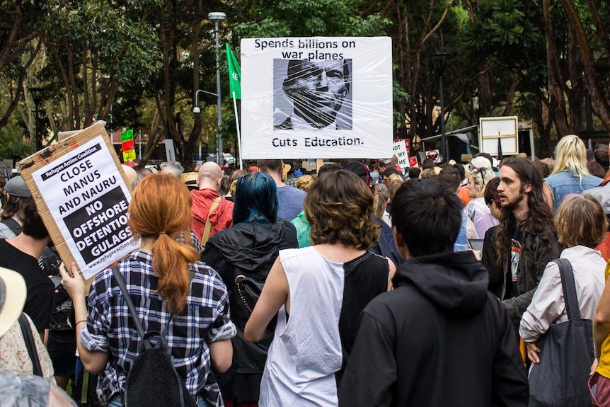 Thousands attend the March in March protest in Belmore Park, Sydney.