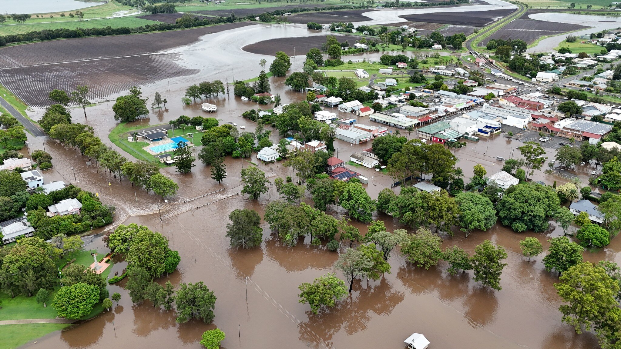 A flooded country town, as seen from above.