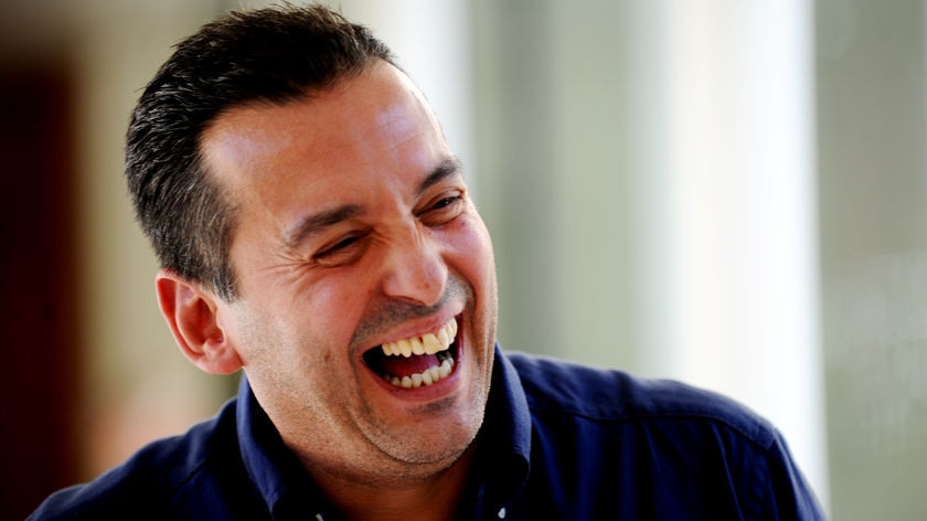 File photo of author Christos Tsiolkas, laughing