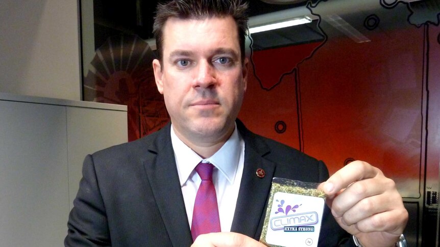 WA Upper House Liberal MP Phil Edman holds a sample of synthetic cannabis