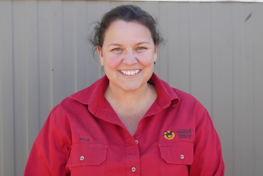 Smiling headshot of Sunset Caravan Park manager Kylie Rixon.