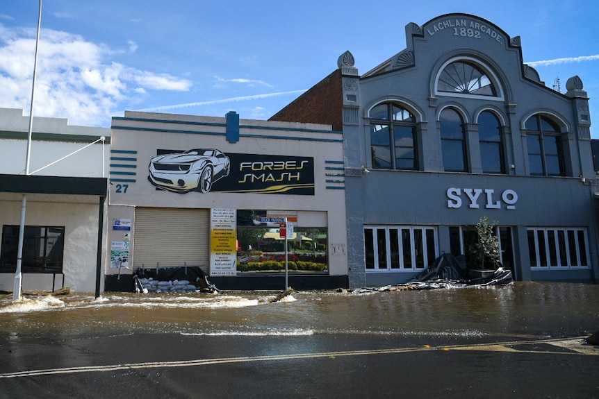 Flooded stores in the street of a small town