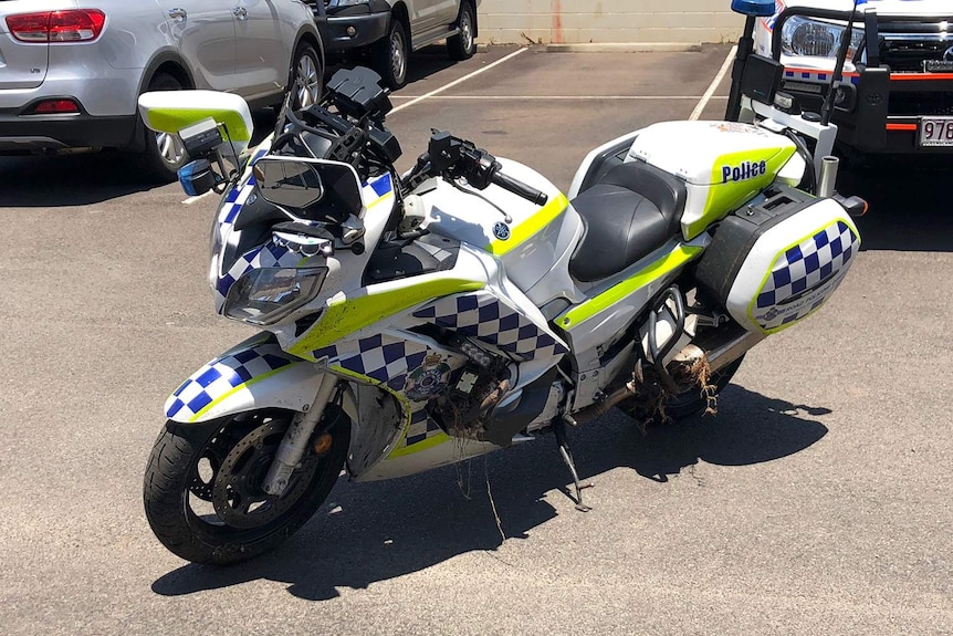 Damaged motorcycle of Queensland police officer in Toowoomba on Queensland's Darling Downs.