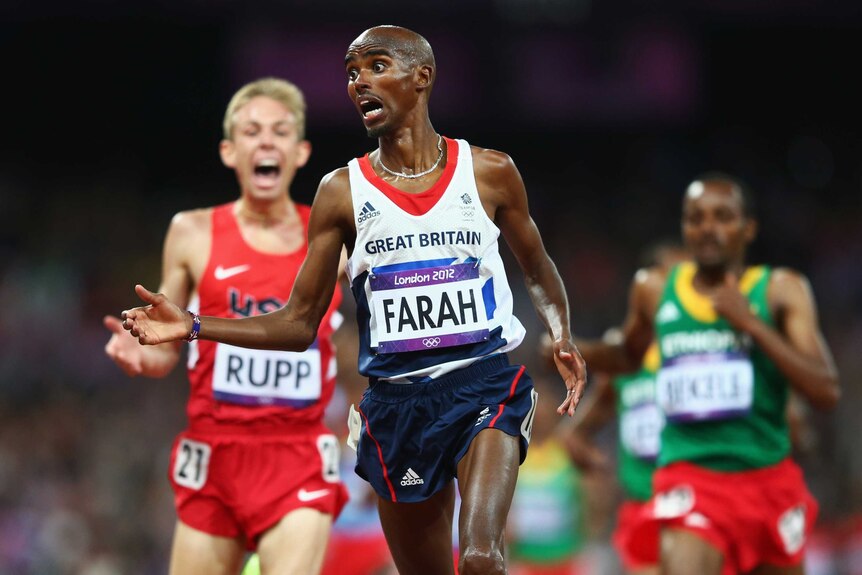 Britain's Mo Farah wins the 10,000m final at the London Olympics ahead of American Galen Rupp (L).
