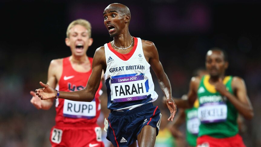 Britain's Mo Farah wins the 10,000m final at the London Olympics ahead of American Galen Rupp (L).