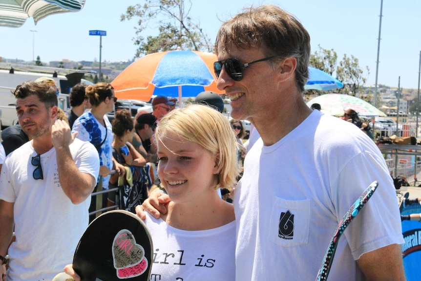 Skateboarders Poppy Olsen and Tony Hawk