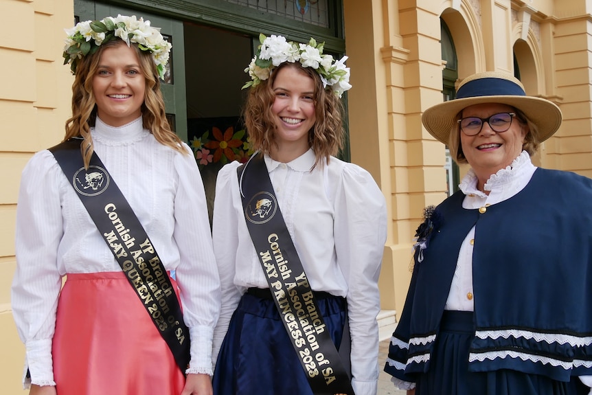 three women in victorian dress