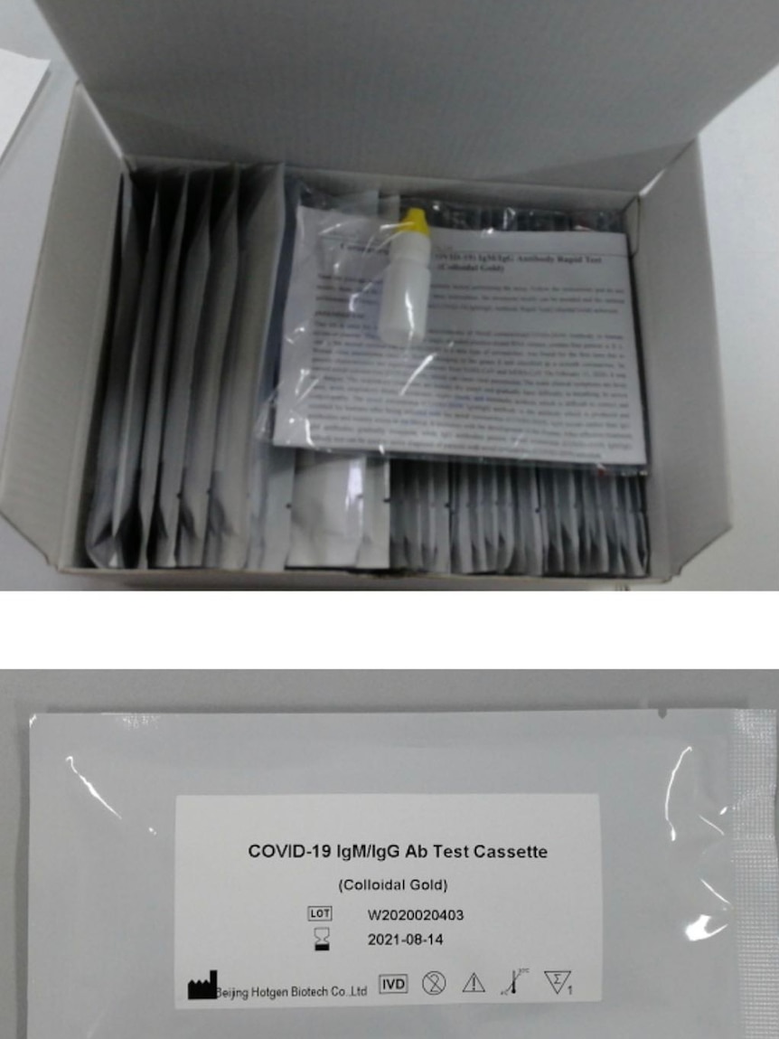 A stack of rapid test kits in a box.