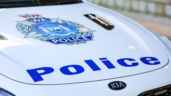 The bonnet of a car with the WA Police crest and the words 'Police'.