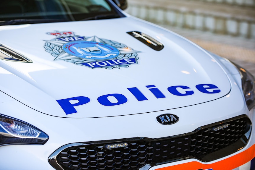 The bonnet of a car with the WA Police crest and the words 'Police'.