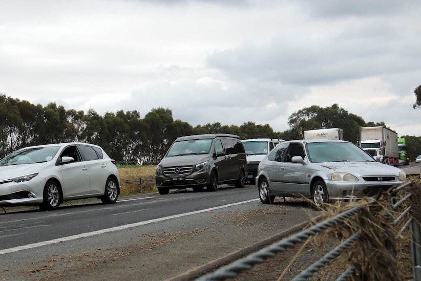 Cars abandoned on the Hume Freeway after floodwaters subsided.