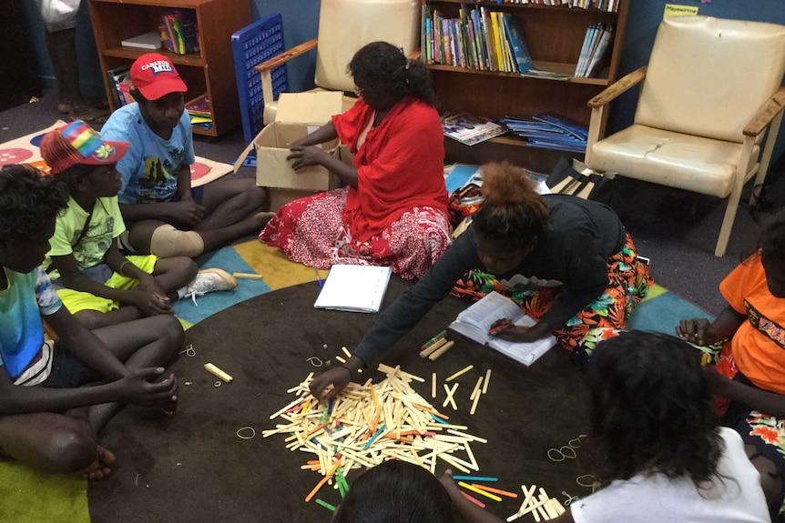 Children involved in a maths teaching activity at Yirrkala School