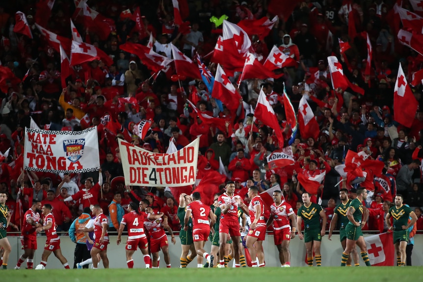 Fans and players celebrate an improbable rugby league victory 