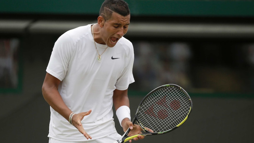 Nick Kyrgios yells out during his match against Milos Raonic at Wimbledon.