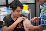 Keinan getting vaccinated