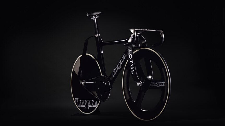 An angled shot of a black track bicycle with Lotus and Hope written on it