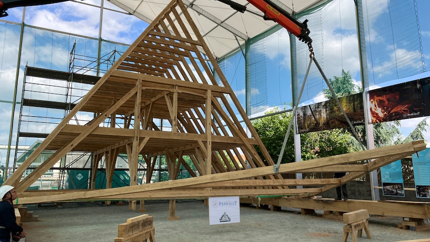 A wooden A-frame for a building roof. 