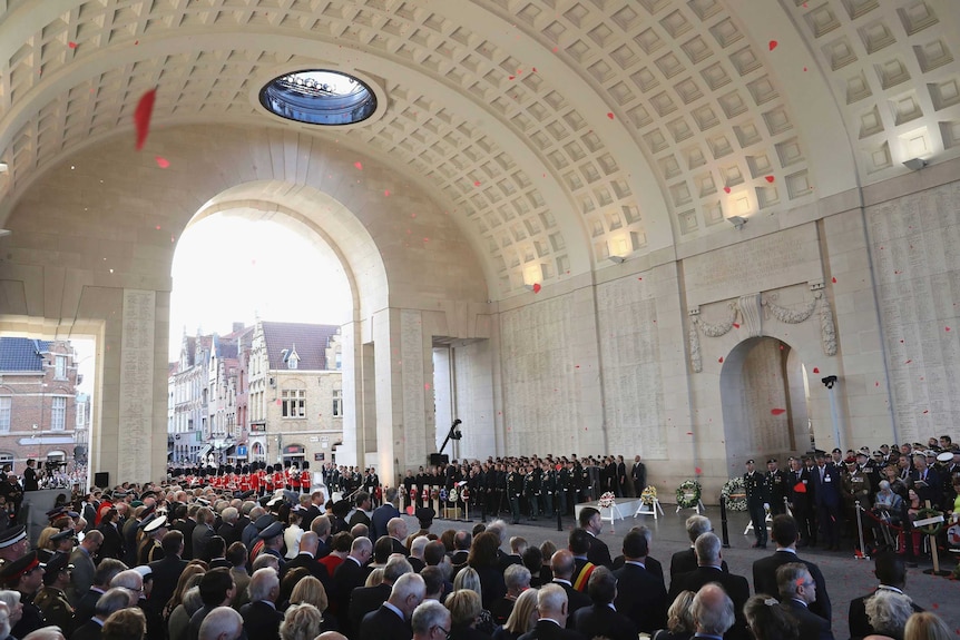 Poppies are dropped during the Last Post ceremony as part of the Passchendaele commemorations.
