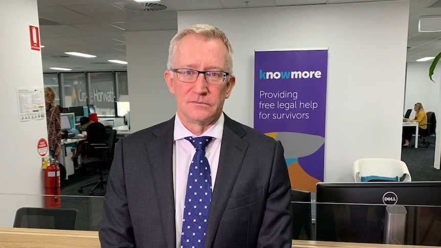 Warren Strange, the director of Knowmore, a legal service for abuse victims, standing in front of his office.