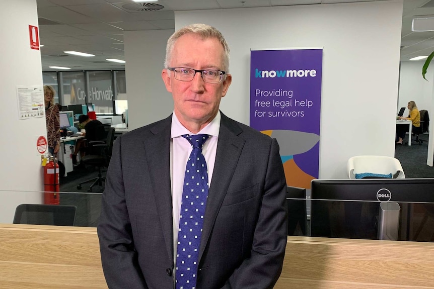 Warren Strange, the director of Knowmore, a legal service for abuse victims, standing in front of his office.