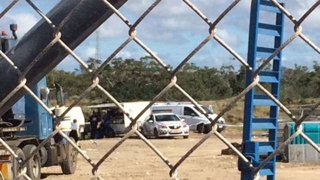 Forensic police at the Bowen dump.
