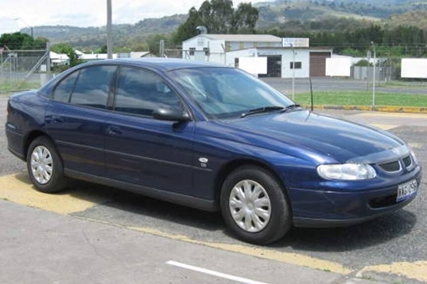 Photo of a dark blue Holden Commodore, similar to the one Mr Groat was driving before he disappeared.