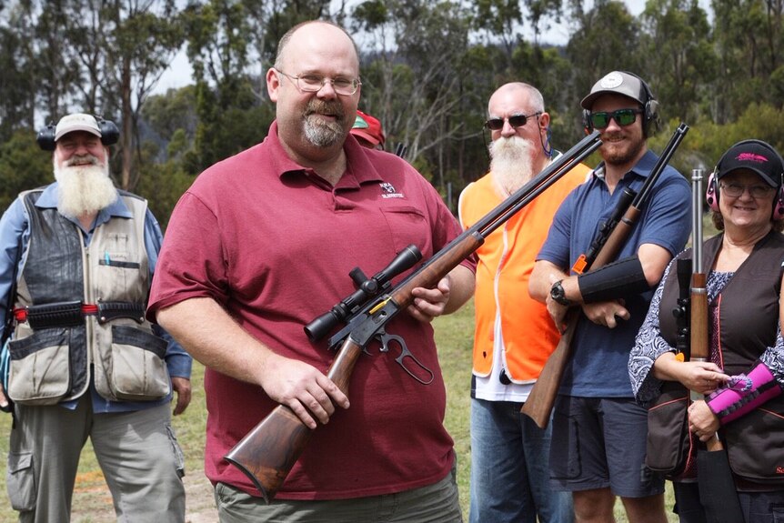 Champion shooter David McCarthy and fellow gun enthusiasts.