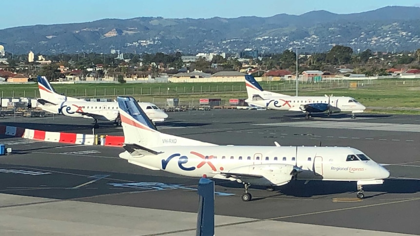 Three aeroplanes on the tarmac