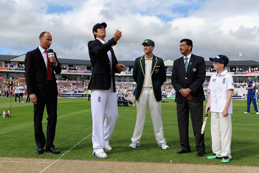 England's Alistair Cook tosses the coin before the fourth Ashes Test