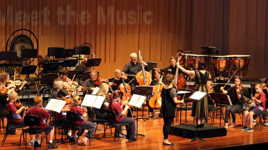 Children from the Goulburn Strings Project performing with the Canberra Symphony Orchestra at Llewellyn Hall, April 2016.
