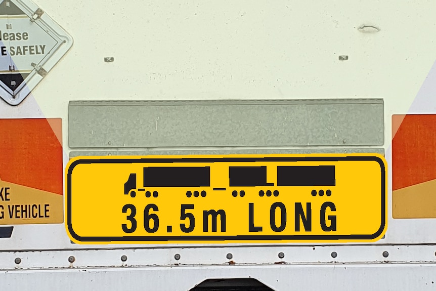 a sign on the back of a truck