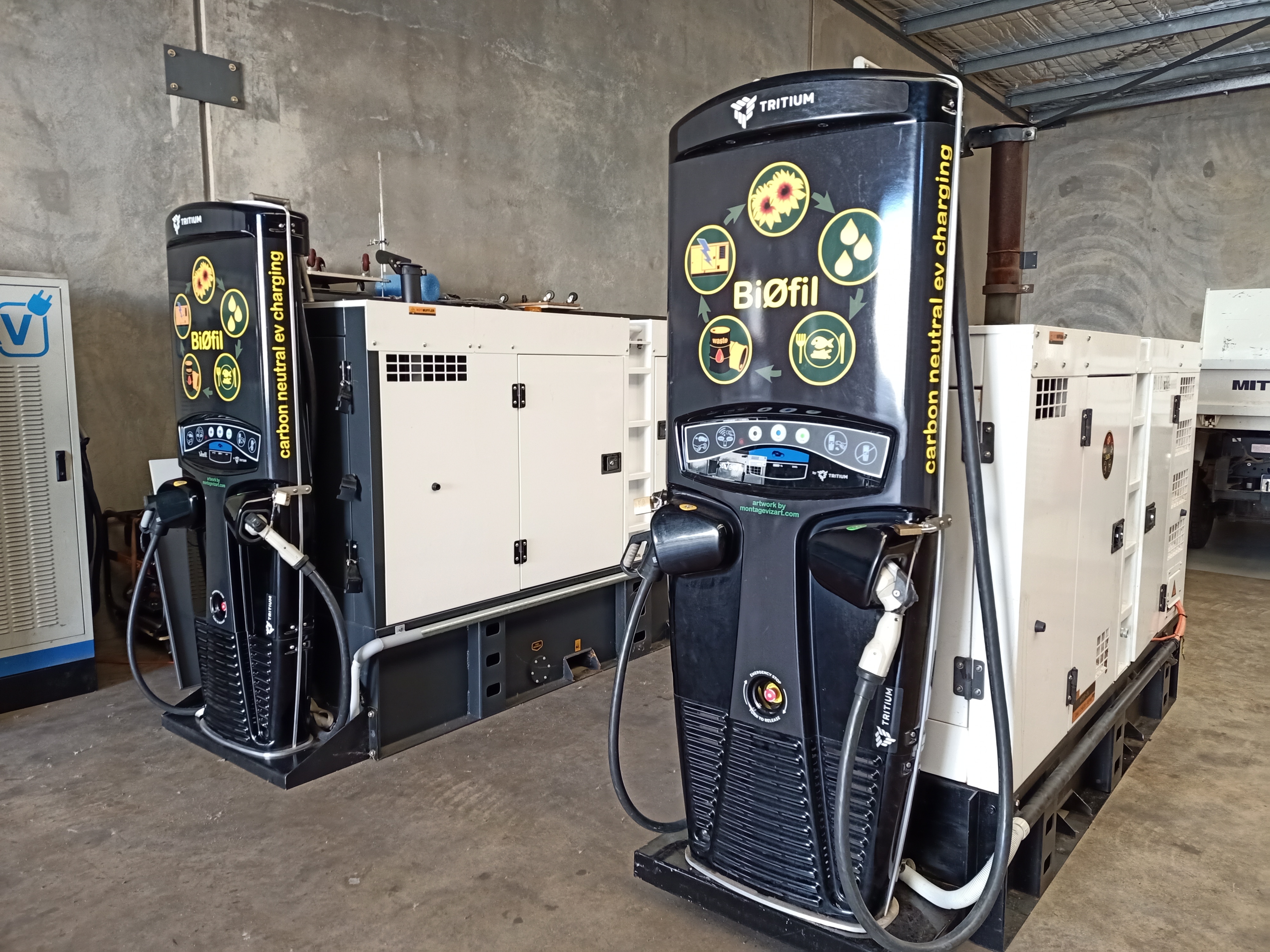 Two large metal boxes with power cords and sockets