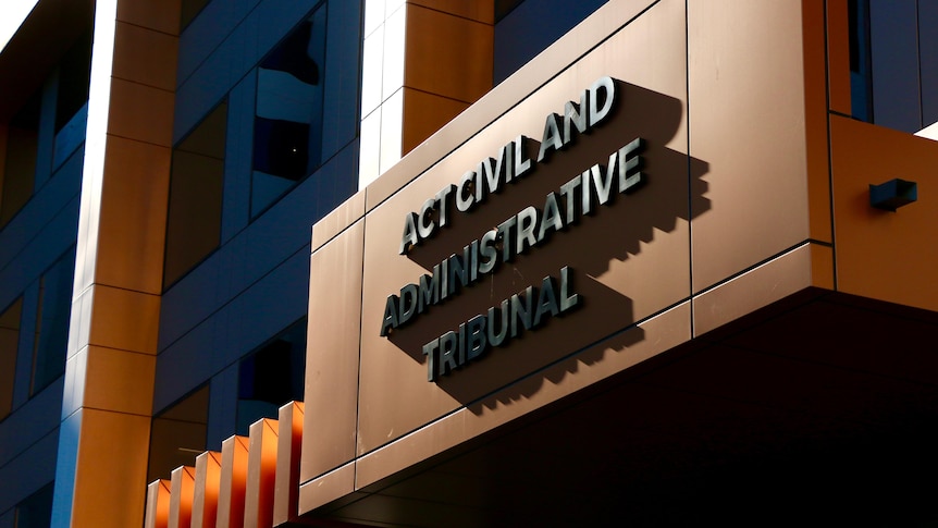 A building sign that reads 'ACT Civil and Administrative Tribunal'. 
