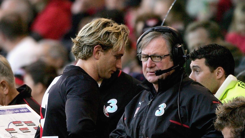 Unlikely return ... Kevin Sheedy (R) does not expect to replace James James Hird in 2014