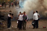 Troops clash with protesters in Cairo's Abbassiya district