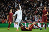 Real Madrid's Cristiano Ronaldo celebrates the opening goal in Champions League tie against Roma.