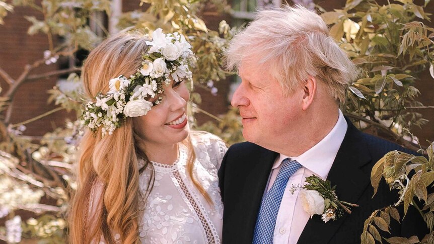Prime Minister Boris Johnson poses with Carrie Symonds at 10 Downing Street following their wedding at Westminster Cathedral.
