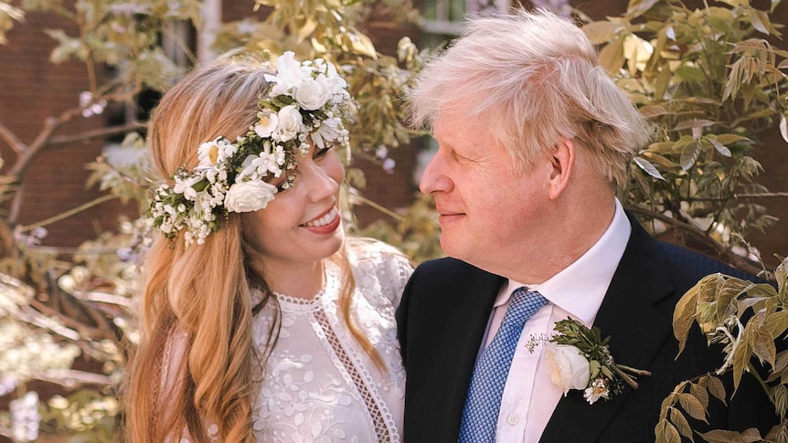 Prime Minister Boris Johnson poses with Carrie Symonds at 10 Downing Street following their wedding at Westminster Cathedral.
