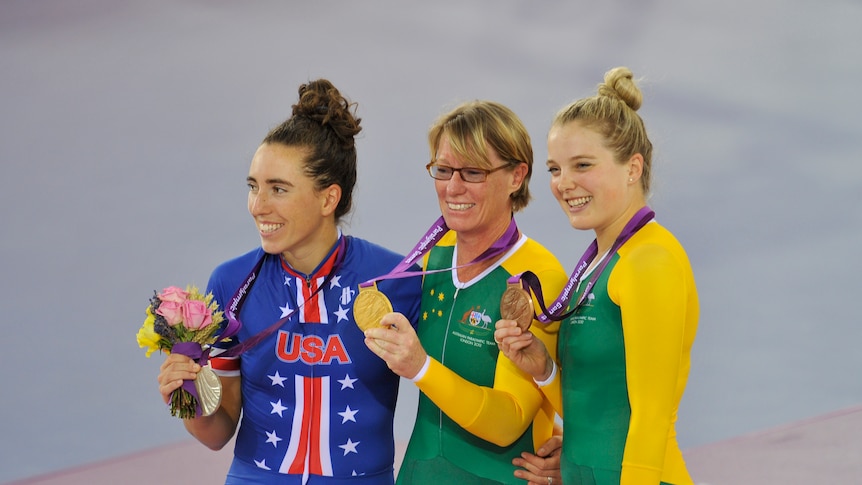 Powell wins first gold