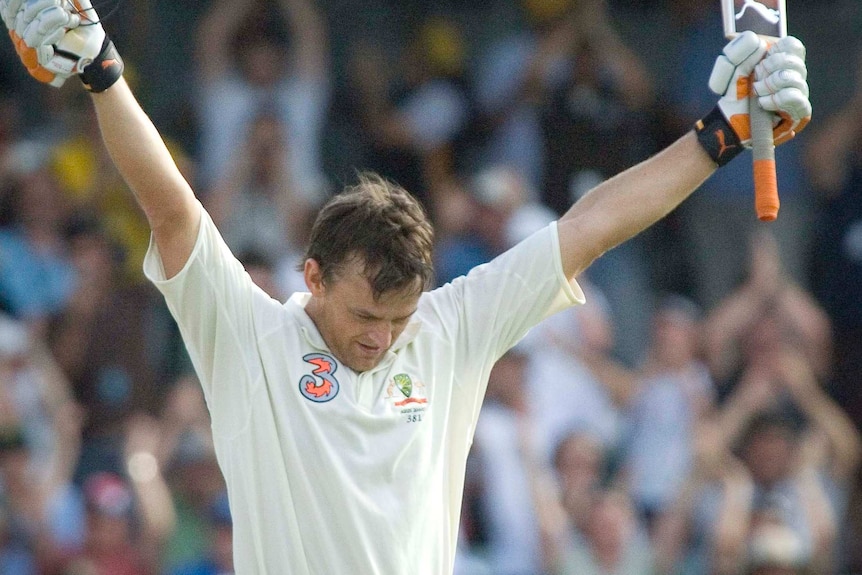 Australia's Adam Gilchrist celebrates his 100 in the Ashes Test against England at the WACA in 2006.