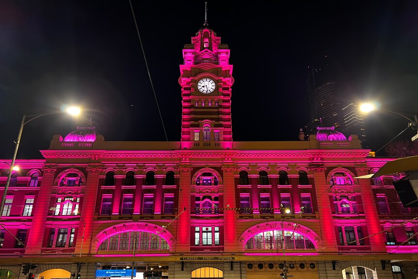 Buildings in Melbourne bathed in a pink light